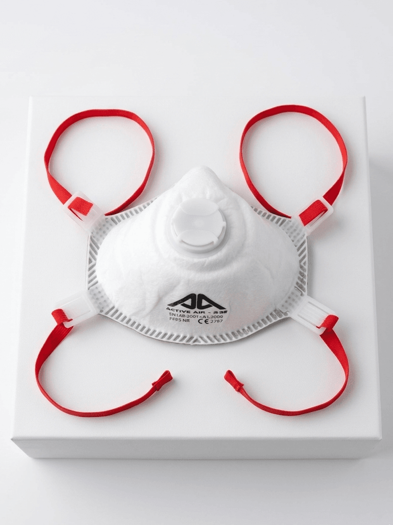 N95 mask with red straps on a white background