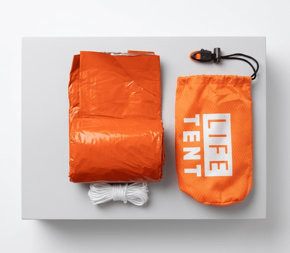 Orange emergency life tent with packaging on a white background