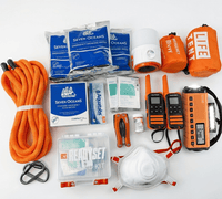Collection of emergency supplies including a rope, water packets, a tent, radios, and medical kits on a white background.